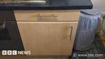 Police search finds man hiding in kitchen cupboard