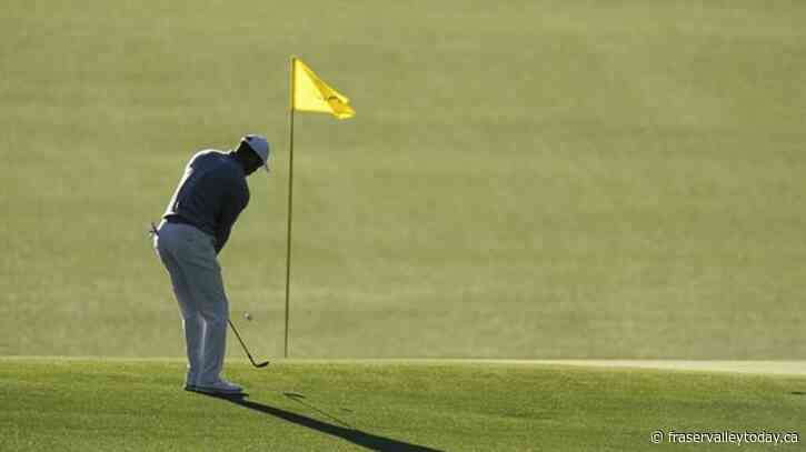 Tiger Woods completes opening round at Masters with a 73, eight shots off the lead