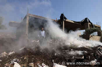 A Palestinian is killed as Israeli settlers storm his village and troops fire on stone-throwers
