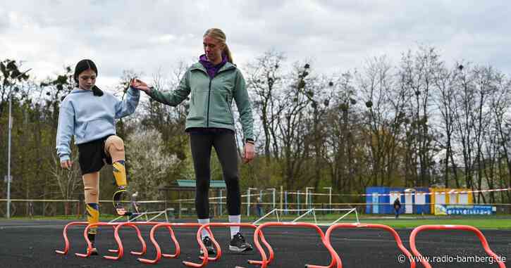 Zwölfjährige Ukrainerin mit Prothesen startet bei Marathon