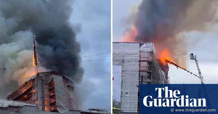 Moment spire collapses at Copenhagen's old stock exchange – video