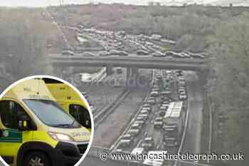 M60 J18 Manchester North: Two taken to hospital after crash