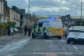 Police called after crash near Asda in Colne