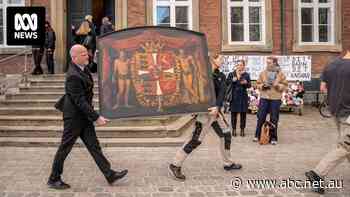 Pedestrians rush into historic Copenhagen building to save artwork from blaze