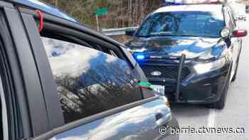 Police tow away car held together by bungee cords, driver charged