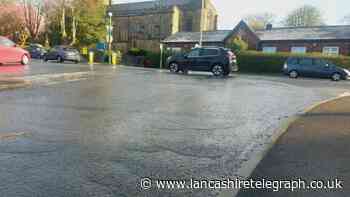 Burst water pipe on busy Blackburn roundabout