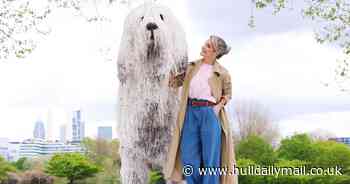 Helen Skelton takes a stroll in London park with a huge 'dog' - made out of mop heads