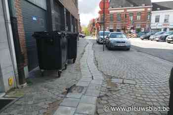Nutswerken verbrodden opmaatgemaakte klinkers van het Kristus-Koningplein