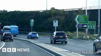 Woman dies after crash with car in police pursuit