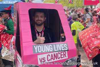 Burnley dad breaks record after running London Marathon as car