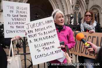 Climate protester will not face court over placard to jury