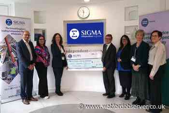 Watford firm donates £20,000 to Citizens Advice bureau