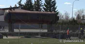 East Calgary road briefly closed after semi-truck collides with power pole