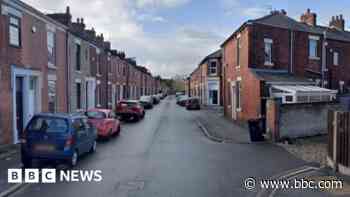 Man in body armour with weapons caught on street