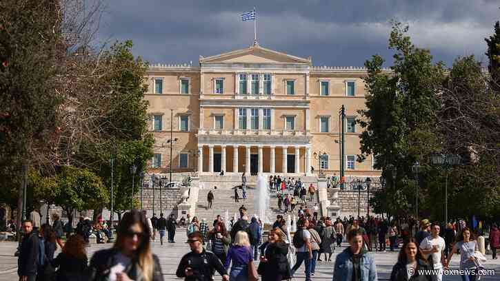 Greek lawmaker will face criminal charges after physical altercation with a colleague in Parliament