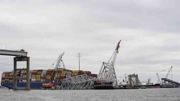 First cargo ship passes through newly opened channel in Baltimore since bridge collapse