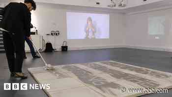 Cleaners and security staff display art in uni show