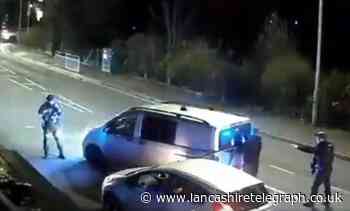 Armed police officers surround van in Nelson
