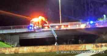 Two arrests as car hits barrier and rolls down embankment into Northumberland river after failing to stop for cops