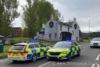 Gateshead road closed after car overturned and one person taken to hospital
