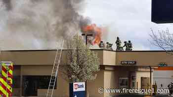 Wash. firefighters caught in roof collapse at bank fire