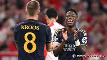 Vinicius' double earns Real draw with Bayern
