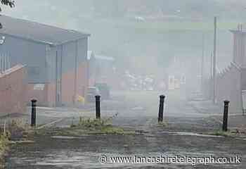 Specialists investigating Great Harwood ' burning smell'