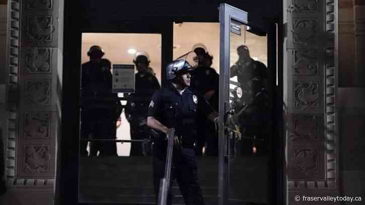 Police begin removing barricades at a pro-Palestinian demonstrators’ encampment at UCLA