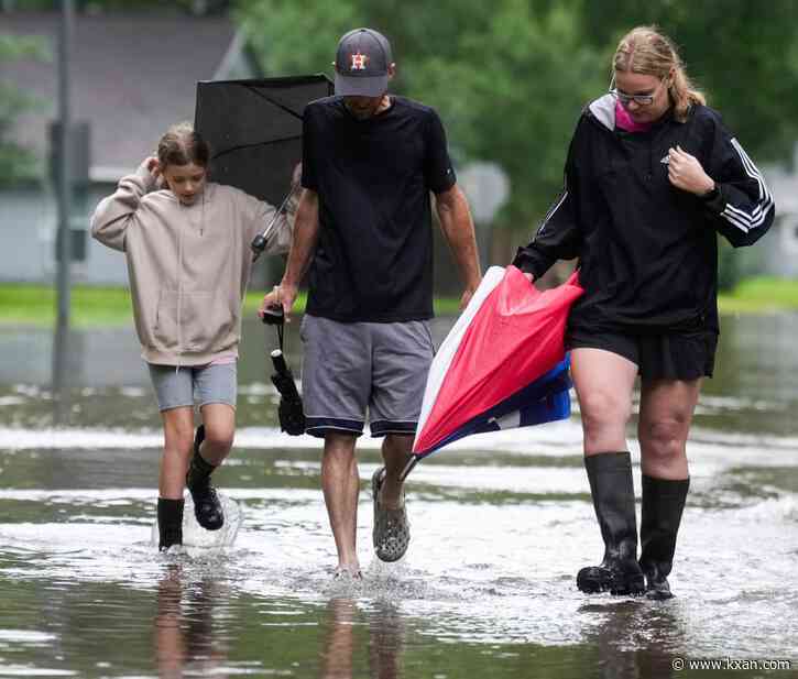 Heavy rains near Houston close schools and flood roadways as officials urge residents to evacuate