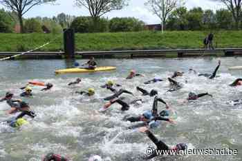Supporteren voor triatleten rond Netekanaal