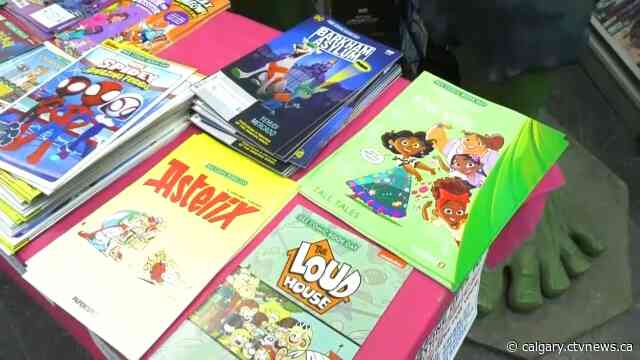 Comic book enthusiasts flock to their favourite store for a free comic