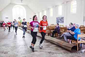 IN BEELD. Meer dan 2.000 sporters lopen door Borgerhoutse straten tijdens Reuzenloop