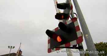 Elderly man falls on train tracks at west Hull level crossing as barriers come down