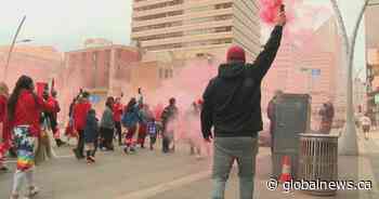 Family of mother and child killed in Edmonton among 100s marking Red Dress Day