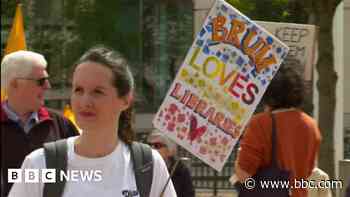 Hundreds gather to protest against council cuts
