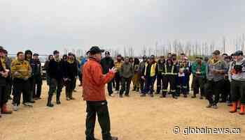 Rain provides help to some firefighters in northern Alberta