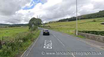 Emergency services close long stretch of Grane Road