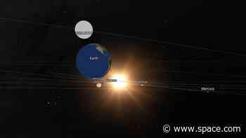 Car-sized asteroid gives Earth a close shave in near-miss flyby (video, photo)