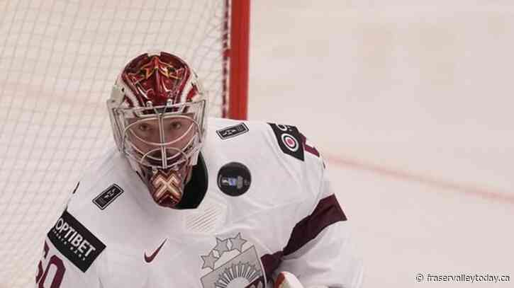 Latvia beats Kazakhstan 2-0 at hockey worlds. Norway tops Denmark