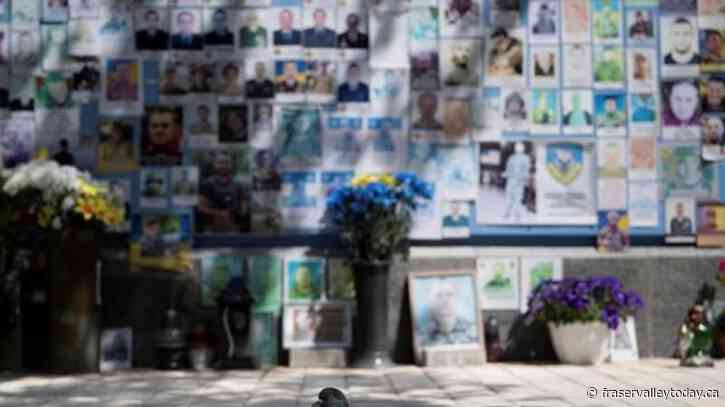 Ukrainian troops pull out of some areas and Zelenskyy postpones foreign trips amid Russian offensive