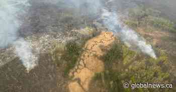 Changing winds expected to help fight Fort McMurray wildfire that’s forced thousands to flee homes