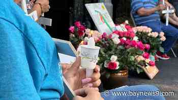 Apopka community holds candlelight vigil to honor the farmworkers killed in the Marion bus crash