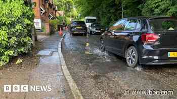 Concern after water pours down road 'for 10 months'