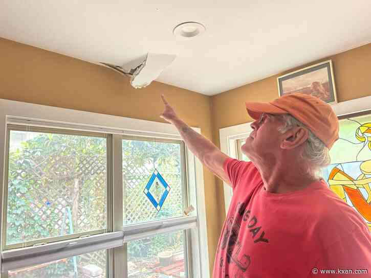 Crews remove branch that fell through south Austin family's roof after storms