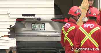 Grey SUV crashes into Saskatoon’s Wellington Manor apartments