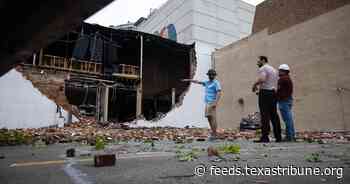 Photos: Storms toppled transmission towers, downed trees and blew out windows across Houston area