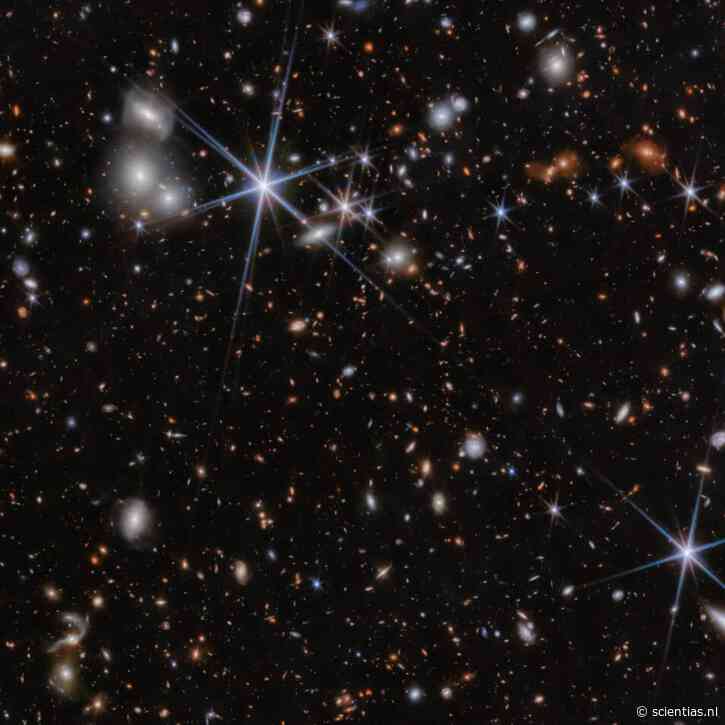 James Webb spot verste fusie ooit: twee zware zwarte gaten die amper 740 miljoen jaar na de oerknal bezig zijn om samen te smelten