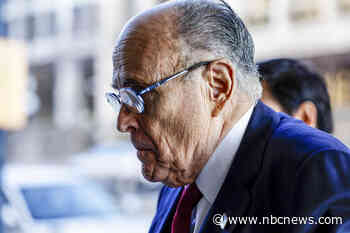 Rudy Giuliani is served indictment papers at his own birthday party after mocking Arizona attorney general