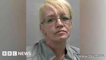 Owner jailed after dog bites two police officers