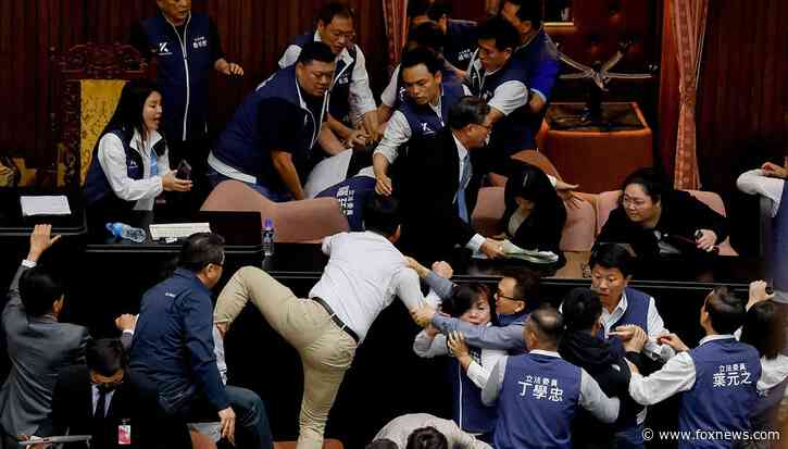 Lawmakers brawl as Taiwan's parliament descends into chaos